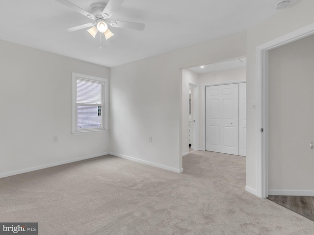 28 Sycamore Rd Unit 45, Manahawkin, NJ 08050 - carpeted empty room with baseboards, ceiling fan, and a smoke detector