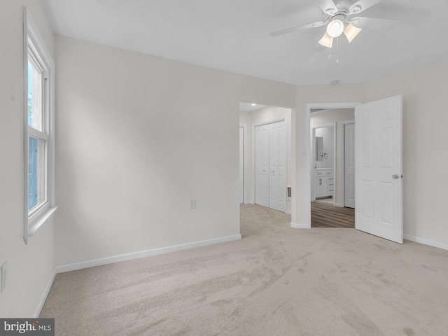 28 Sycamore Rd Unit 45, Manahawkin, NJ 08050 - unfurnished bedroom featuring carpet floors, baseboards, a closet, and a ceiling fan