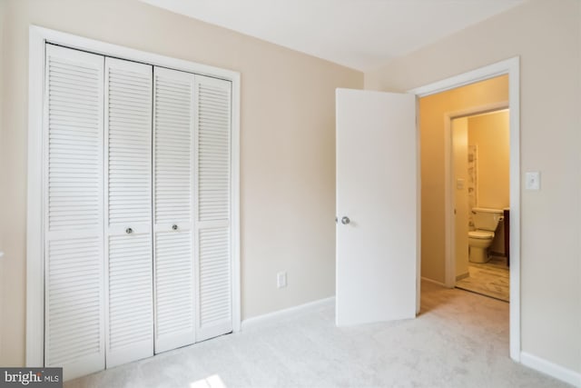 19918 Wyman Way, Germantown, MD 20874 - unfurnished bedroom with a closet, light carpet, and baseboards