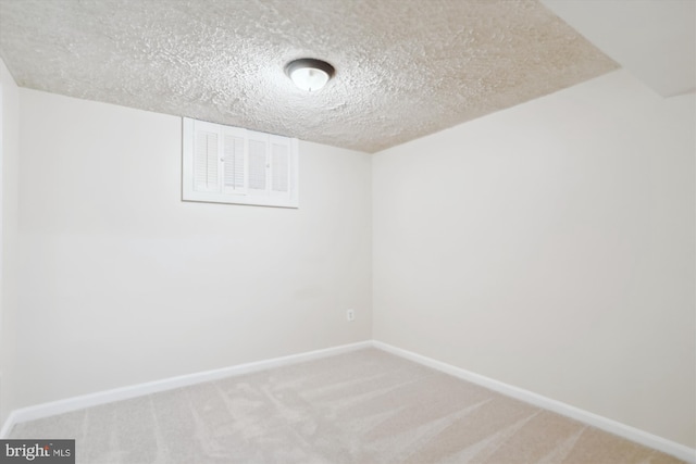 19918 Wyman Way, Germantown, MD 20874 - spare room featuring baseboards, carpet floors, and a textured ceiling