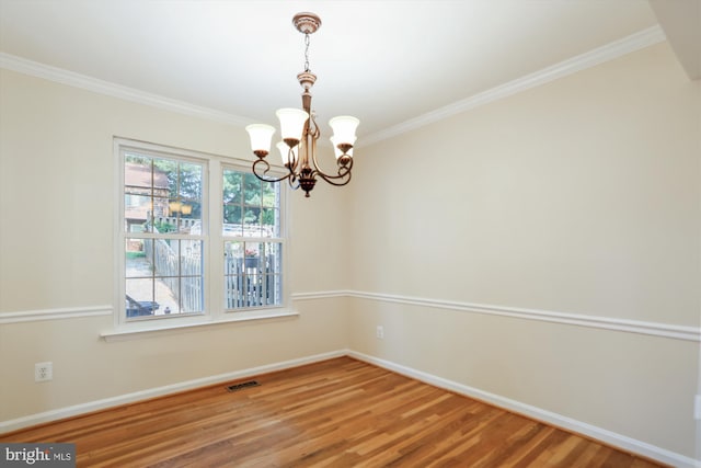 19918 Wyman Way, Germantown, MD 20874 - unfurnished room with a chandelier, baseboards, crown molding, and wood finished floors
