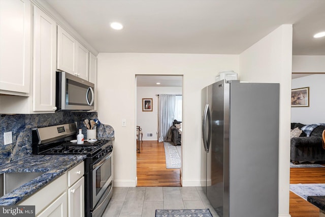 44 Rolling Ln, Hamilton, NJ 08690 - kitchen featuring stainless steel appliances, white cabinets, backsplash, light wood-type flooring, and recessed lighting