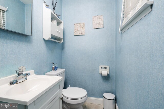 44 Rolling Ln, Hamilton, NJ 08690 - bathroom featuring toilet, vanity, and tile patterned flooring