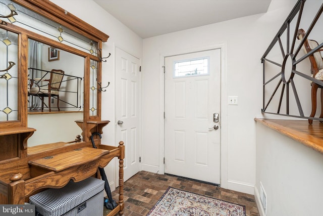 44 Rolling Ln, Hamilton, NJ 08690 - foyer with brick floors and baseboards