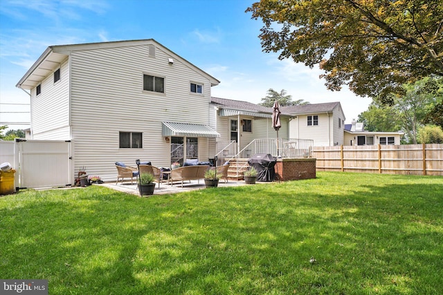 44 Rolling Ln, Hamilton, NJ 08690 - back of property featuring an outdoor hangout area and a patio