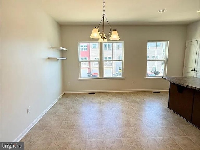 4118 Votive, Williamsburg, VA 23188 - unfurnished dining area with a chandelier, baseboards, and recessed lighting