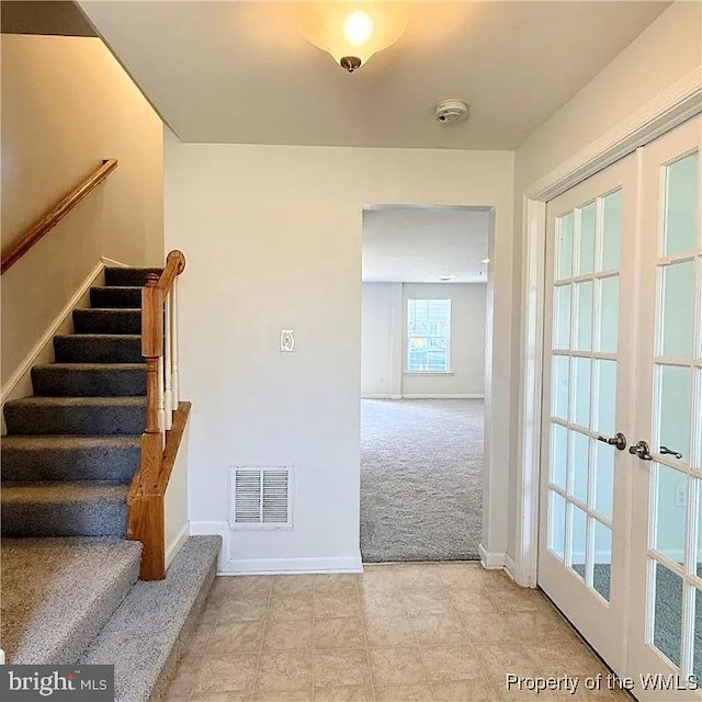 4118 Votive, Williamsburg, VA 23188 - staircase with carpet, baseboards, and french doors