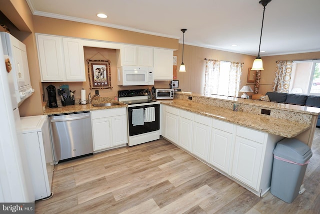 17 139th St Unit 101, Ocean City, MD 21842 - kitchen with dishwasher, range with electric stovetop, white microwave, a peninsula, and ornamental molding