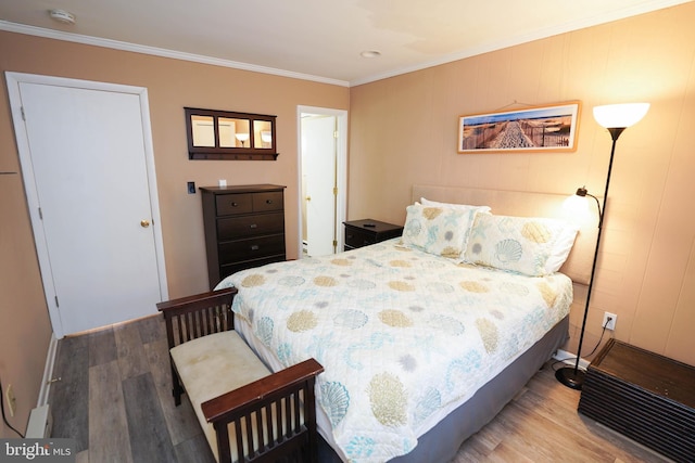 17 139th St Unit 101, Ocean City, MD 21842 - bedroom featuring wood finished floors, crown molding, and baseboards