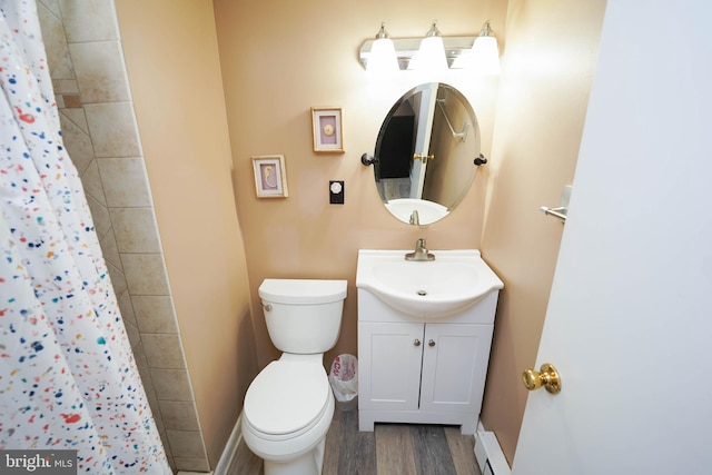 17 139th St Unit 101, Ocean City, MD 21842 - full bath with wood finished floors, toilet, vanity, tiled shower, and baseboards