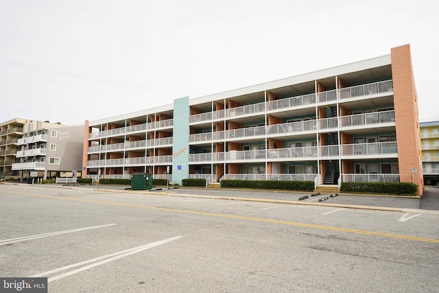 17 139th St Unit 101, Ocean City, MD 21842 - view of apartment building / complex featuring uncovered parking