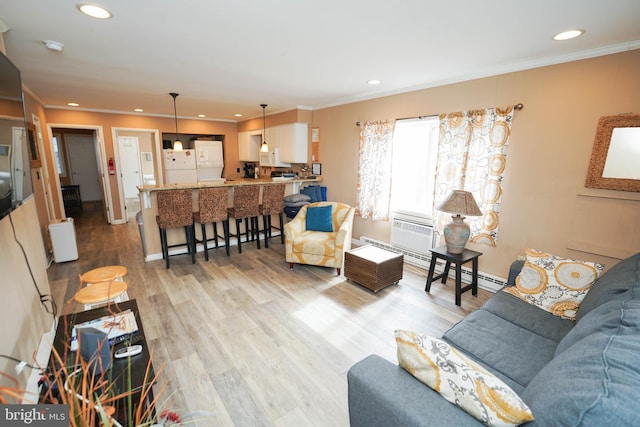 17 139th St Unit 101, Ocean City, MD 21842 - living room featuring ornamental molding, recessed lighting, light wood-style flooring, radiator heating unit, and a baseboard heating unit