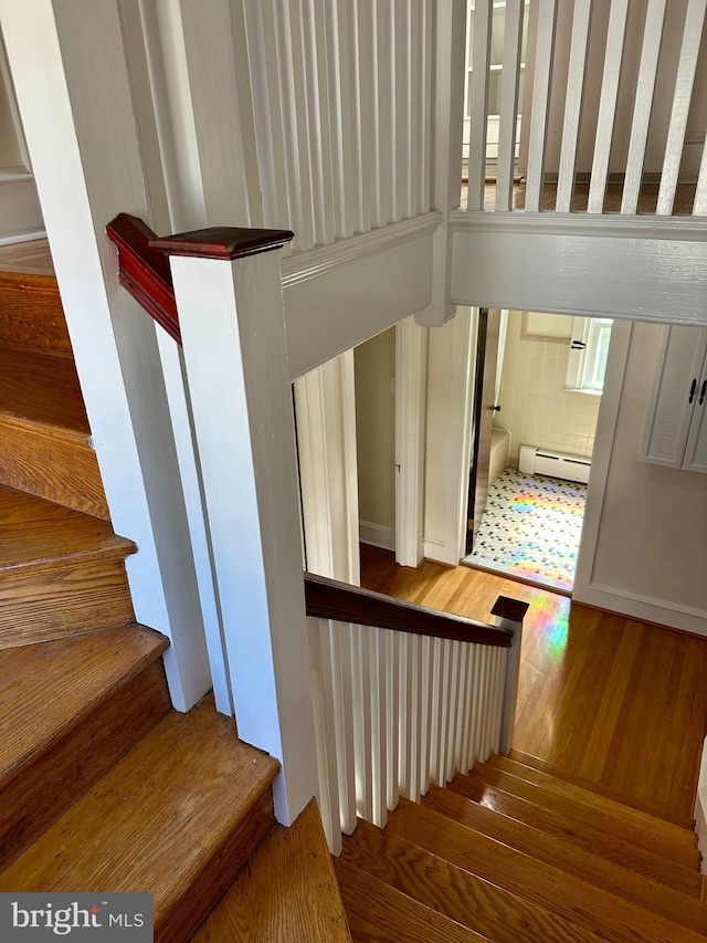 647 Aronimink Pl, Drexel Hill, PA 19026 - stairway featuring a baseboard radiator and wood finished floors