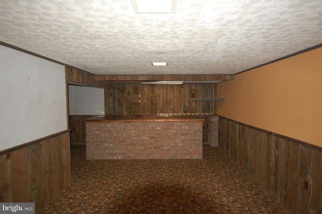 19104 Roman Way, Gaithersburg, MD 20886 - bar featuring wooden walls, crown molding, and a wainscoted wall