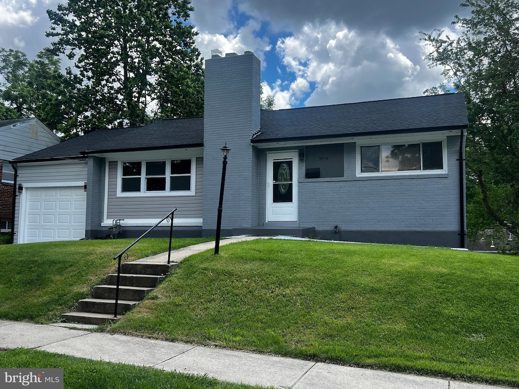 3914 Havard St, Silver Spring, MD 20906 - ranch-style home featuring an attached garage, a chimney, a front yard, and brick siding