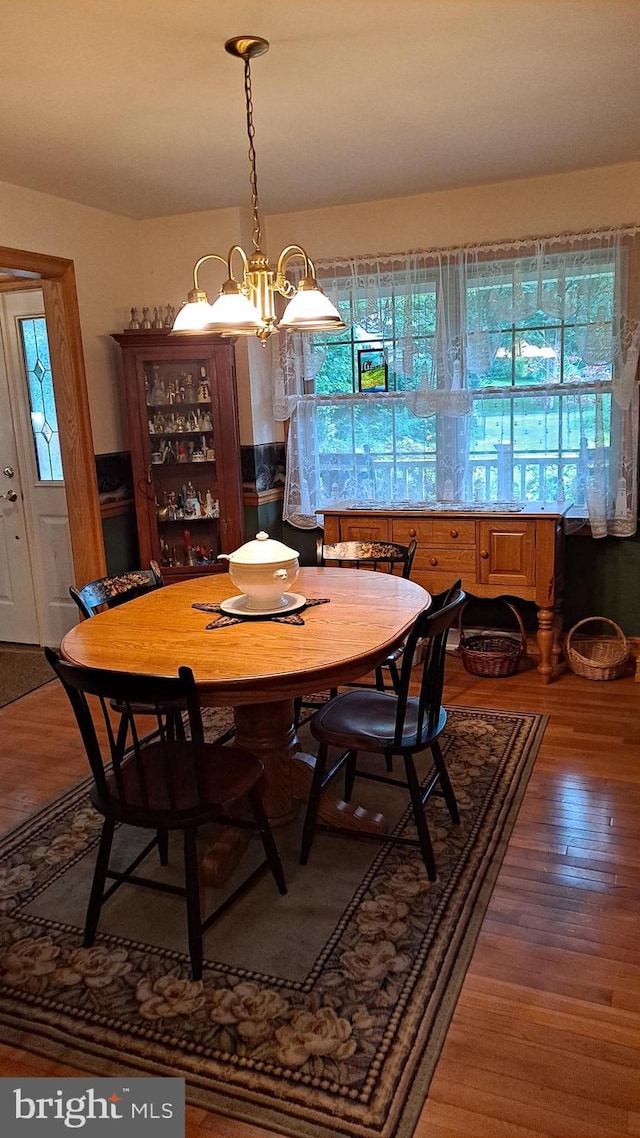 711 Tristan Trl, Chambersburg, PA 17202 - dining space with healthy amount of natural light, wood finished floors, and a chandelier