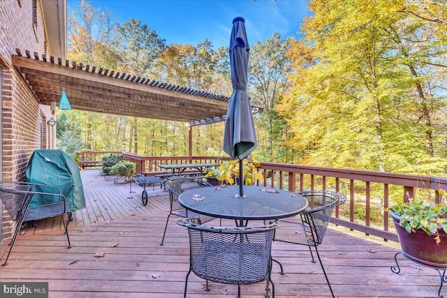 8150 Wolf Run Shoals Rd, Clifton, VA 20124 - wooden terrace with outdoor dining area