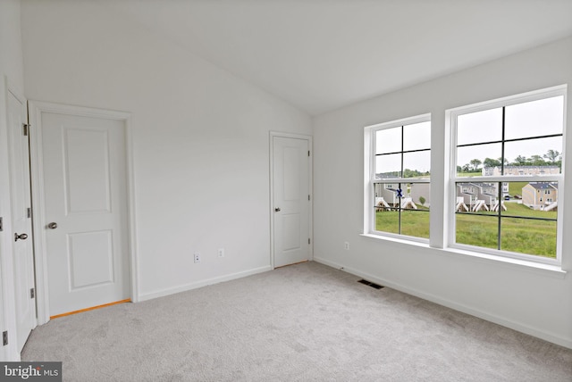 16 Angus Dr, Hanover, PA 17331 - carpeted spare room with lofted ceiling and baseboards