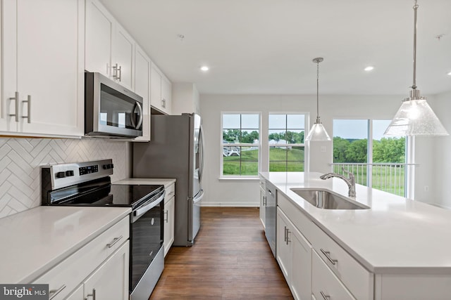 16 Angus Dr, Hanover, PA 17331 - kitchen featuring appliances with stainless steel finishes, a sink, dark wood-style floors, tasteful backsplash, and recessed lighting