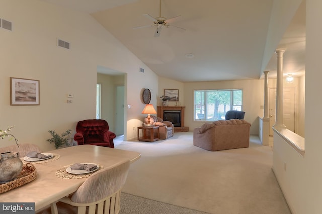 7 Brookside Cir, Myerstown, PA 17067 - living room with light carpet, high vaulted ceiling, a ceiling fan, and a glass covered fireplace