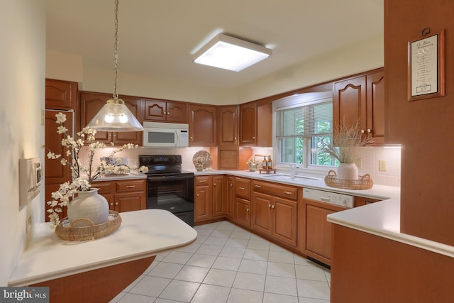 7 Brookside Cir, Myerstown, PA 17067 - kitchen featuring white microwave, dishwasher, black electric range, a sink, and decorative backsplash
