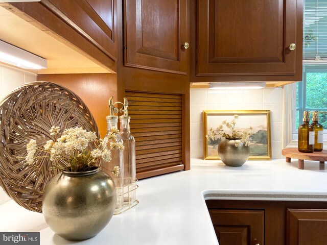 7 Brookside Cir, Myerstown, PA 17067 - detailed view of backsplash, dark brown cabinets, and light countertops