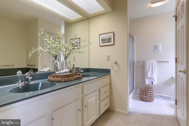 7 Brookside Cir, Myerstown, PA 17067 - bathroom with double vanity, a shower stall, and baseboards
