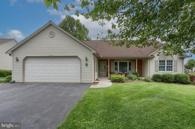 7 Brookside Cir, Myerstown, PA 17067 - single story home with driveway, an attached garage, a front yard, roof with shingles, and a porch