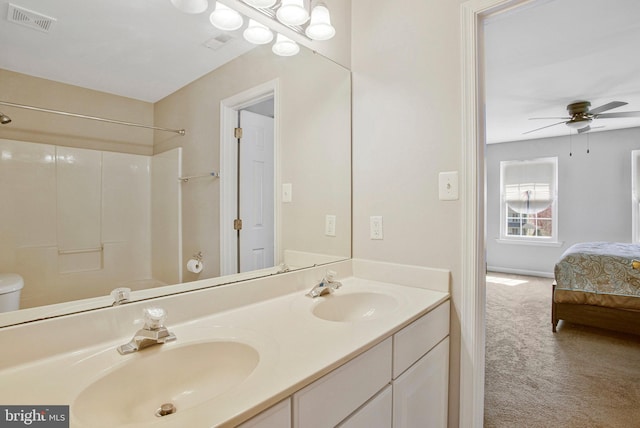3270 Channel Ct, Huntingtown, MD 20639 - ensuite bathroom with double vanity, ceiling fan, toilet, and bathtub / shower combination
