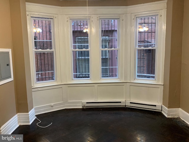 4621 N Broad St, Philadelphia, PA 19140 - unfurnished dining area with electric panel, baseboards, and a decorative wall