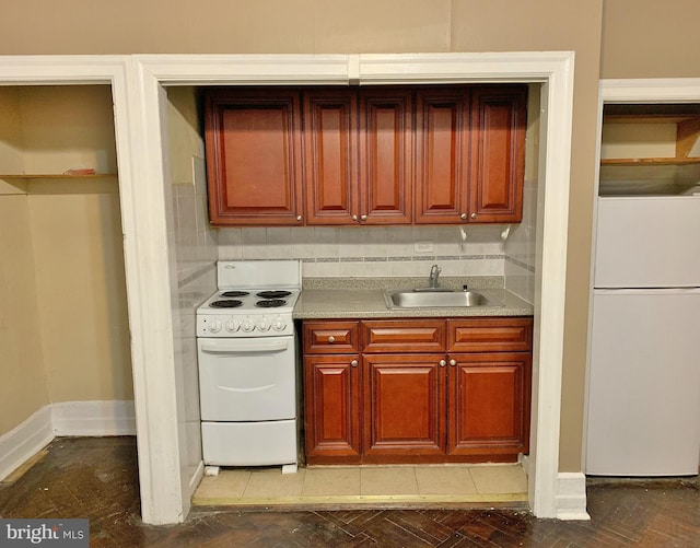 4621 N Broad St, Philadelphia, PA 19140 - kitchen featuring white appliances, a sink, and light countertops
