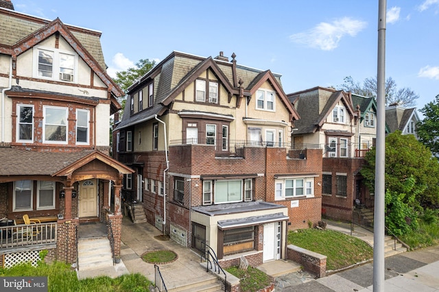 4621 N Broad St, Philadelphia, PA 19140 - multi unit property with a residential view, brick siding, and a garage