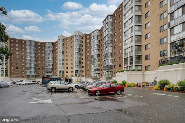 15115 Interlachen Dr Unit 3-920, Silver Spring, MD 20906 - view of apartment building / complex with uncovered parking