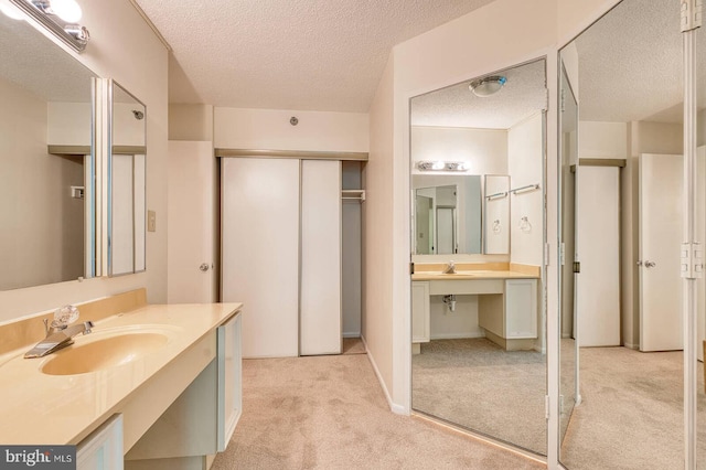 15115 Interlachen Dr Unit 3-920, Silver Spring, MD 20906 - bathroom featuring a textured ceiling and vanity