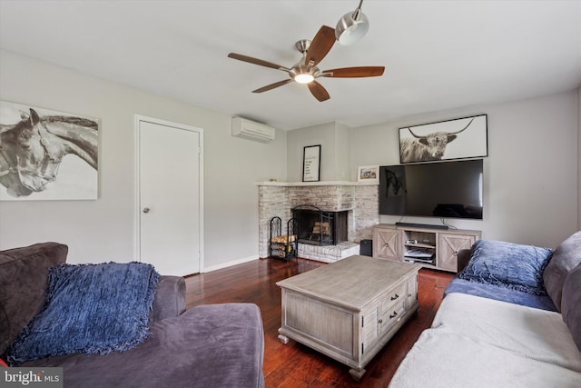4811 Kings Rd, Doylestown, PA 18902 - living area with a wall mounted AC, ceiling fan, a fireplace, dark wood-style floors, and baseboards
