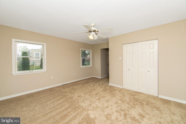 681 Dutton Cir, Springfield, PA 19064 - unfurnished bedroom with carpet flooring, a closet, baseboards, and a ceiling fan