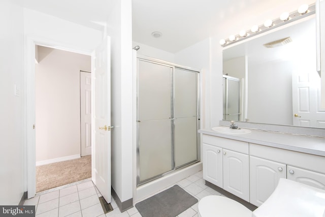 681 Dutton Cir, Springfield, PA 19064 - full bathroom with a shower stall, vanity, tile patterned flooring, and toilet