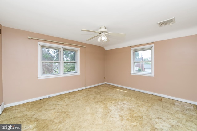 681 Dutton Cir, Springfield, PA 19064 - carpeted empty room with healthy amount of natural light, a ceiling fan, and baseboards