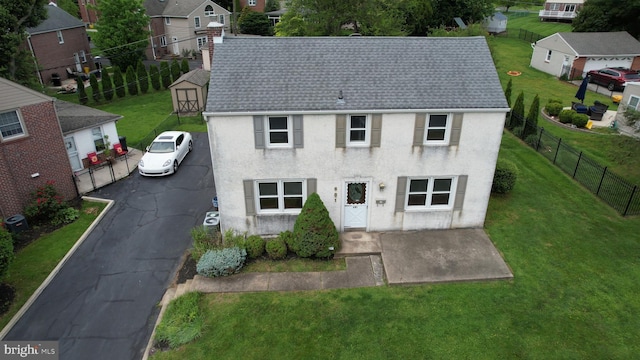 681 Dutton Cir, Springfield, PA 19064 - view of front of home with stucco siding, a residential view, and roof with shingles