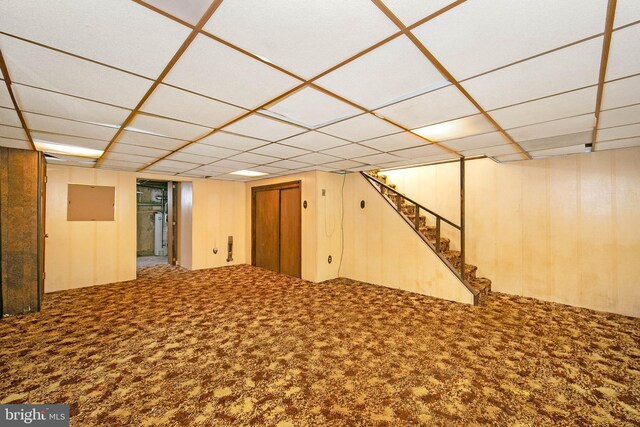681 Dutton Cir, Springfield, PA 19064 - finished below grade area with a paneled ceiling, carpet flooring, and stairway