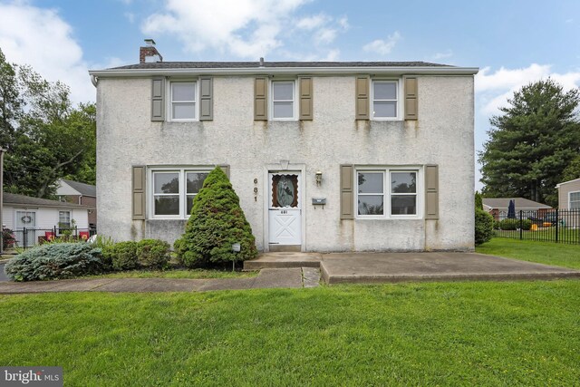 681 Dutton Cir, Springfield, PA 19064 - townhome / multi-family property featuring stucco siding and a chimney