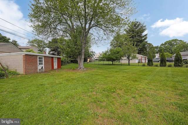 681 Dutton Cir, Springfield, PA 19064 - view of yard featuring an outbuilding
