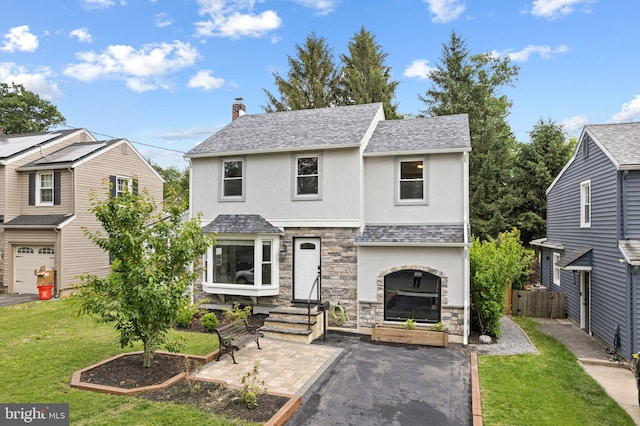 1104 W Mount Vernon Ave, Haddon Township, NJ 08033 - view of front of home with stucco siding, stone siding, a chimney, entry steps, and a shingled roof