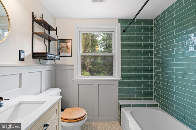 1104 W Mount Vernon Ave, Haddon Township, NJ 08033 - full bathroom featuring toilet, vanity, bathtub / shower combination, a decorative wall, and a wainscoted wall