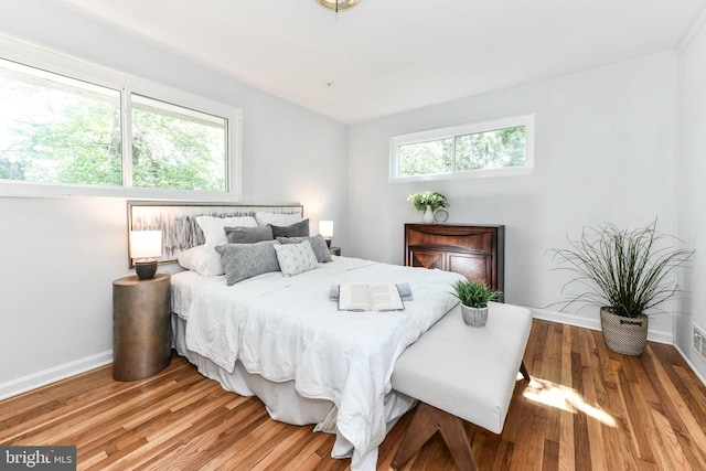 6322 Phyllis Ln, Alexandria, VA 22312 - bedroom with baseboards and wood finished floors