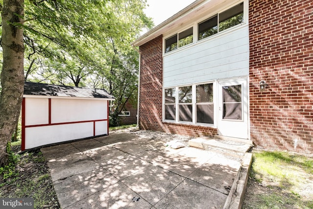 6322 Phyllis Ln, Alexandria, VA 22312 - view of patio / terrace with an outdoor structure