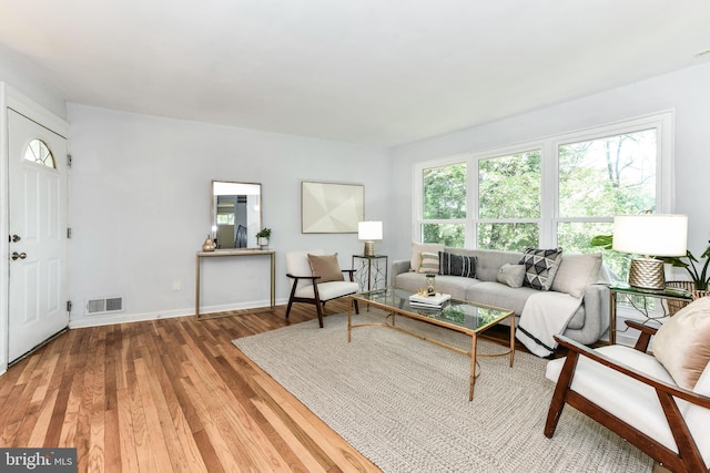 6322 Phyllis Ln, Alexandria, VA 22312 - living area featuring wood finished floors and baseboards