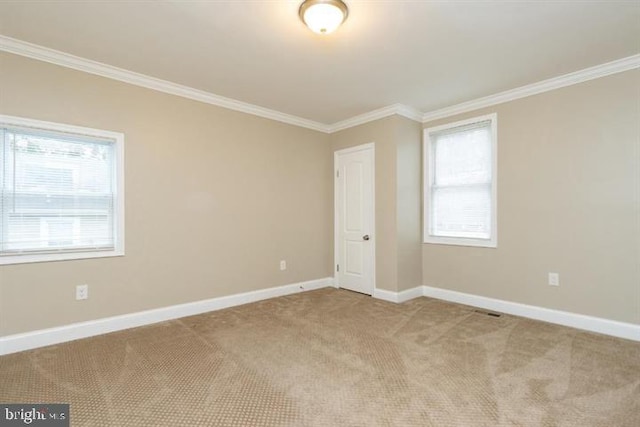 2306 Monticello Rd, Baltimore, MD 21216 - empty room featuring crown molding, light carpet, and baseboards