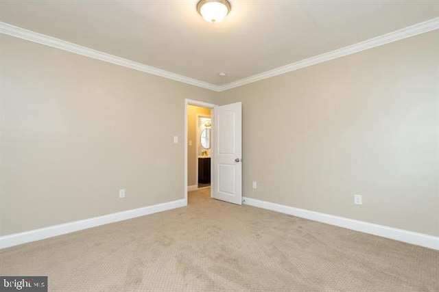 2306 Monticello Rd, Baltimore, MD 21216 - unfurnished room featuring crown molding, baseboards, and light carpet