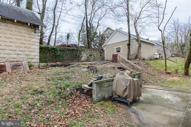 2306 Monticello Rd, Baltimore, MD 21216 - view of yard featuring a patio